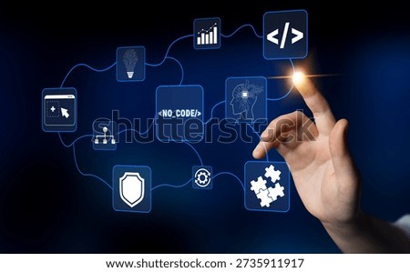 Innovative No Code Technology Concept with Hand Touching Digital Symbols for Future Application Development and Seamless User Experience Quark.