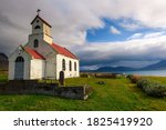 Innra-Holmskirkja church with a cemetery located near the village of Akranes in Iceland.