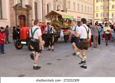 INNSBRUCK, AUSTRIA - APRIL 24: Men Are Dancing In Traditional Austrian Leather Breeches (Lederhosen) For 