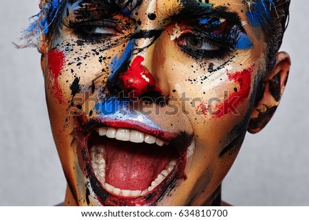 Insane laughing evil Clown with creative Face Art
