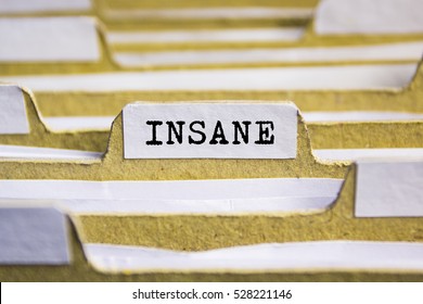Insane word on card index paper
