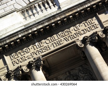 Inscription Above The Entrance Of The Central Criminal Court Fondly Known As The Old Bailey In London, England, UK, Which Reads Defend The Children Of The Poor And Punish The Wrongdoer