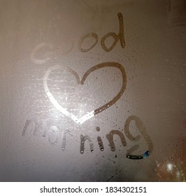 Inscription Good Morning On The Sweaty Foggy Bathroom Mirror