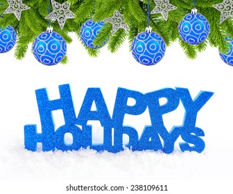 Inscription of happy holidays is on snow with christmas decorations