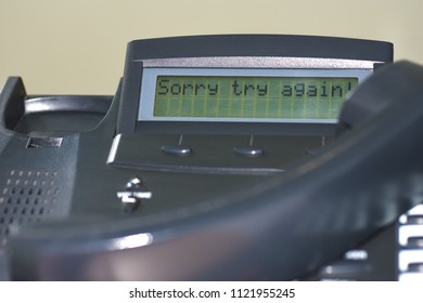 The Inscription On The Display Of The Office Wire Telephone Sorry Try Again