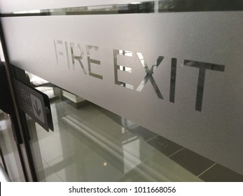 the inscription on the door of the fire exit