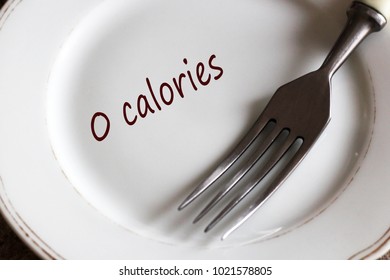 The Inscription On The Empty Plate Has No Calories And Fork, The Topic Of Weight Loss, Health