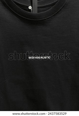 The inscription on the T-shirt is individualistic
