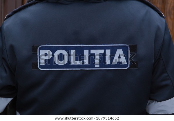 Inscription POLICE in Romanian or Moldovan. Power\
structure of the\
state.