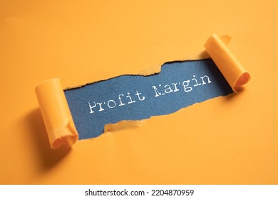 The inscription Profit margin on an orange background - Shutterstock ID 2204870959