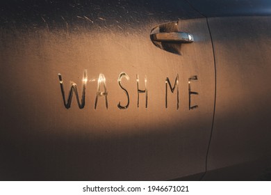 Inscription Wash Me On Dirty Car