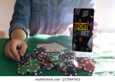 inscription your bet wins on a smartphone on the poker table. - Shutterstock ID 2175697415