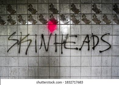 Inscriptions on the wall, an act of vandalism in a destroyed and abandoned building. - Powered by Shutterstock