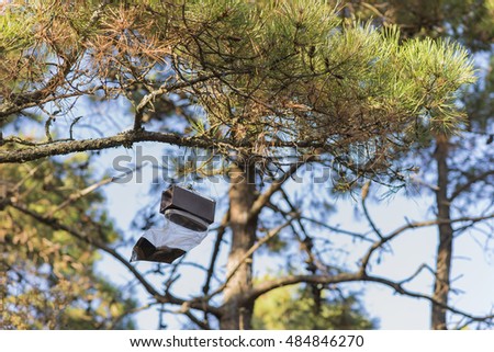 Similar – Image, Stock Photo trapped in plastic | the former green grass of the willow