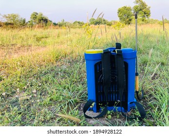 Insecticide Sprayer Lying On The Grass