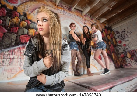 Insecure European teenager being bullied by female gang