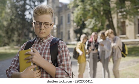 Insecure Smart School Boy Suffering From Weight Teasing By Popular Classmates