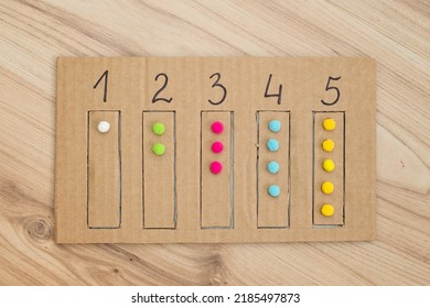 Insert the appropriate ball strap into the designated numbered slot. Elementary mathematics. A tool for preschool education. Children's Early Learning Montessori Counting Kit.