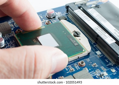 Inserting Cpu Processor Into Motherboard Socket Stock Photo 102051493 ...