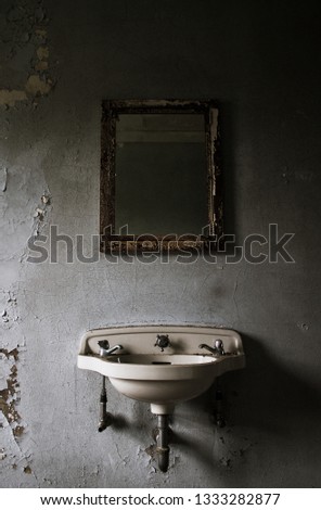 Similar – Morbid mood. A toilet bowl stands in a dilapidated house. Wallpaper and paint come off the wall and through an open window you can see a shrub