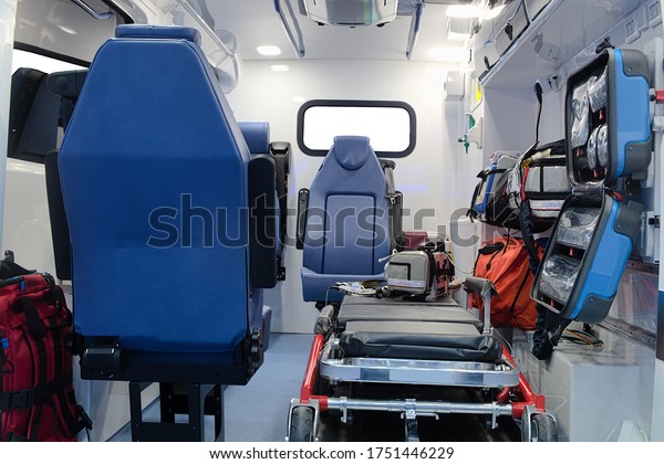 Inside an ambulance car with medical\
equipment for helping patients before delivery to\
hospital