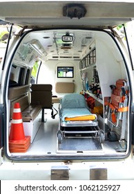 Inside an ambulance with medical equipment . Car for patient refer .