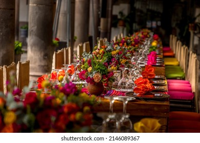 Inside A Baroque Church With Decor Of Tables And Flower Decoration On A Main Event.