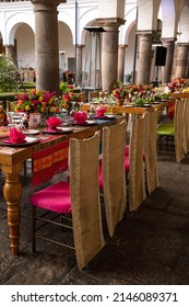 Inside A Baroque Church With Decor Of Tables And Flower Decoration On A Main Event.