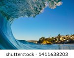                                Inside of a beautiful breaking wave with a unique view of a famous but secluded Laguna Niguel beach in Southern California.