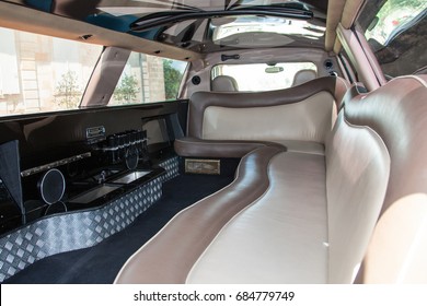 Inside A Beautiful  Limousine White And Brown - Luxury Limo Interior