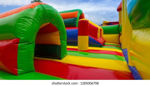 Inside big, inflatable castle labyrinth on playground - Shutterstock ID 1285006708