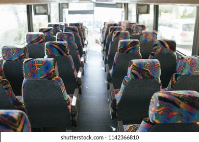 Inside Of A Big Tour Bus. Empty Seats Waiting For Passengers.