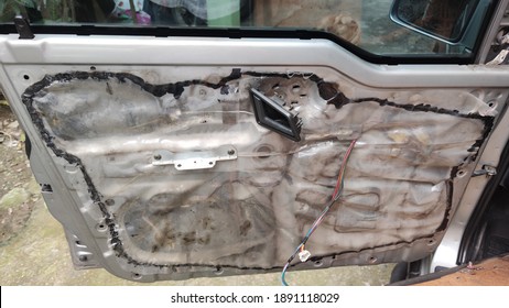 Inside Of A Car Door That Has Been Removed For Door Latch Repair