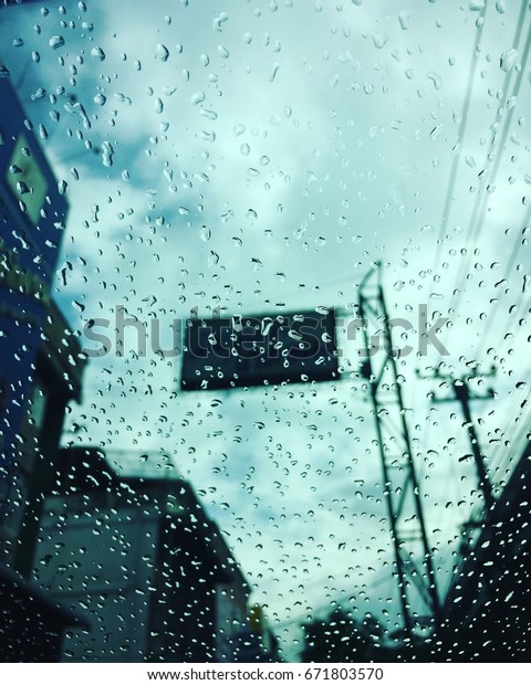 Inside the car of the rainy\
holiday