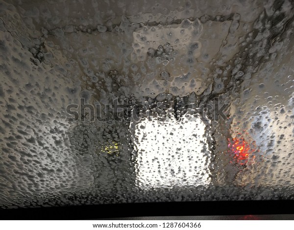 Inside of car view\
of an automatic car wash