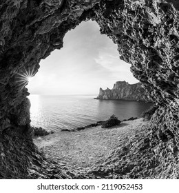 Inside A Cave. View To The Sea Shore From Cave Entrance