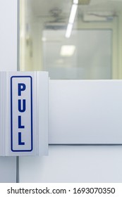 Inside The Cleanroom.The Steel Door Handle Inside White Sterile Cleanroom.