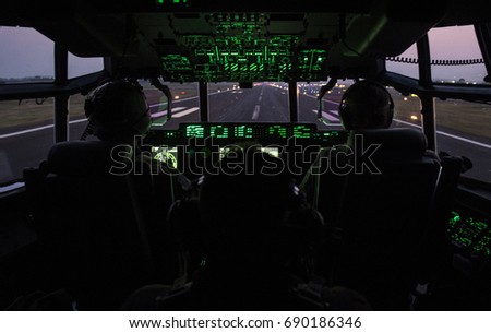 Inside the cockpit of C-130J Super Hercules.