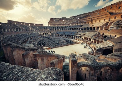 Inside Colosseum view at sunset, the world known landmark and the symbol of Rome, Italy.