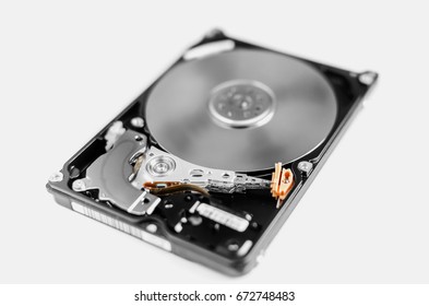 Inside of computer hard disk drive close up HDD not isolated on white background. Shallow depth of field