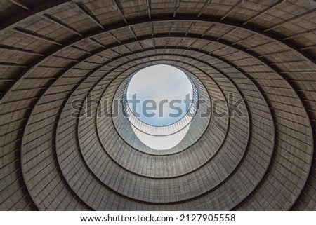 Similar – Image, Stock Photo Nuclear power plant cooling towers reflection in lake with swans in France