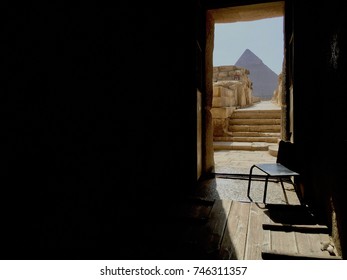 From Inside A Dark Room, The Door Opens To Reveal The Great Pyramid Of Giza, Egypt