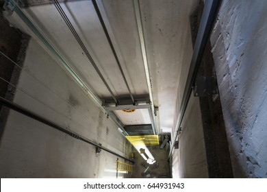 Inside an elevator shaft.