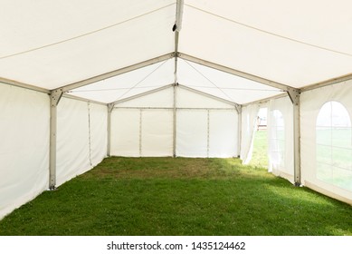 Inside Empty White Tent Waiting For Event Arrangement