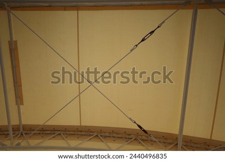 Inside empty white tent waiting for event arrangement
