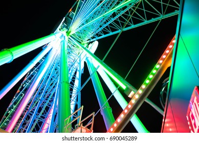 Inside Ferris Wheel Colors Green, Red, Blue Around National Harbor MD 