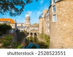 Inside the fortified city of Boulogne-sur-Mer, castle in foreground, Basilica of Our Lady of the Immaculate Conception in background