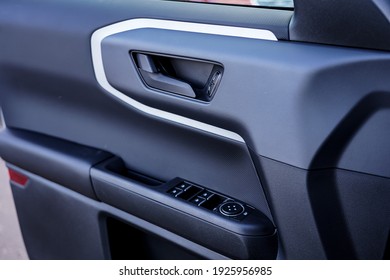 Inside Of A Front Door On A New Car With Handle