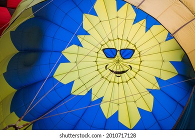 Inside Of Hot Air Baloon With Yellow Smile Sun With Sunglasses