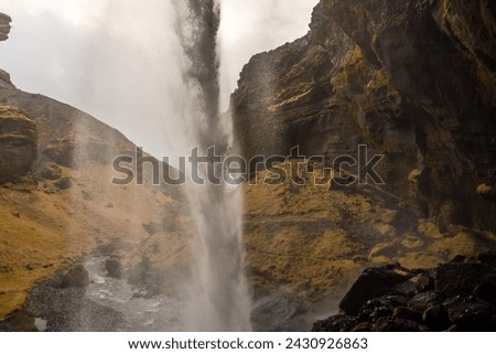 Inside the Kvernufoss Waterfall, Iceland